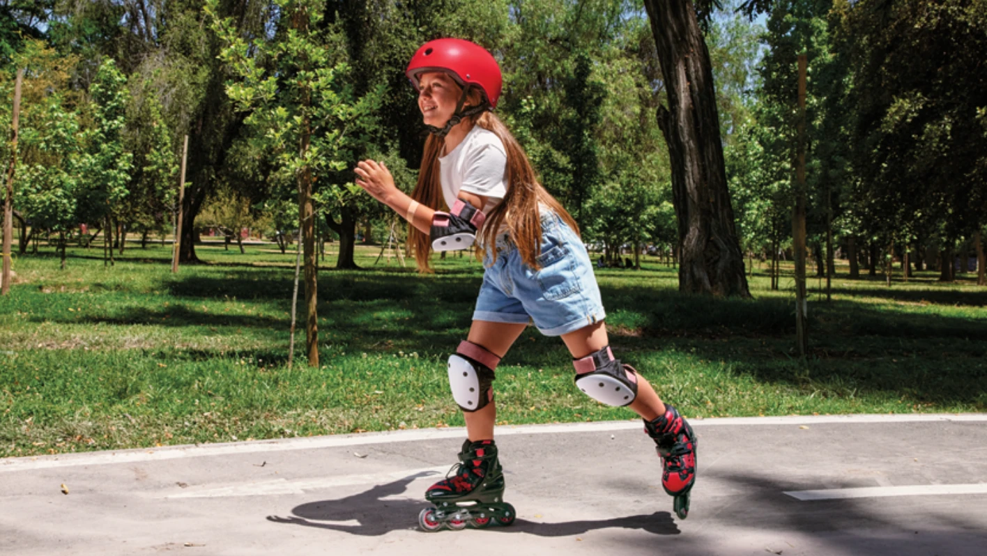 Girl rollerblading on a sunny day